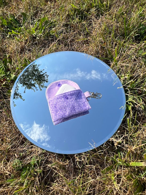 Purple polka dot AirPod case