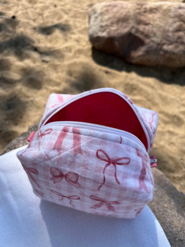 Pink gingham bow Makeup Bags
