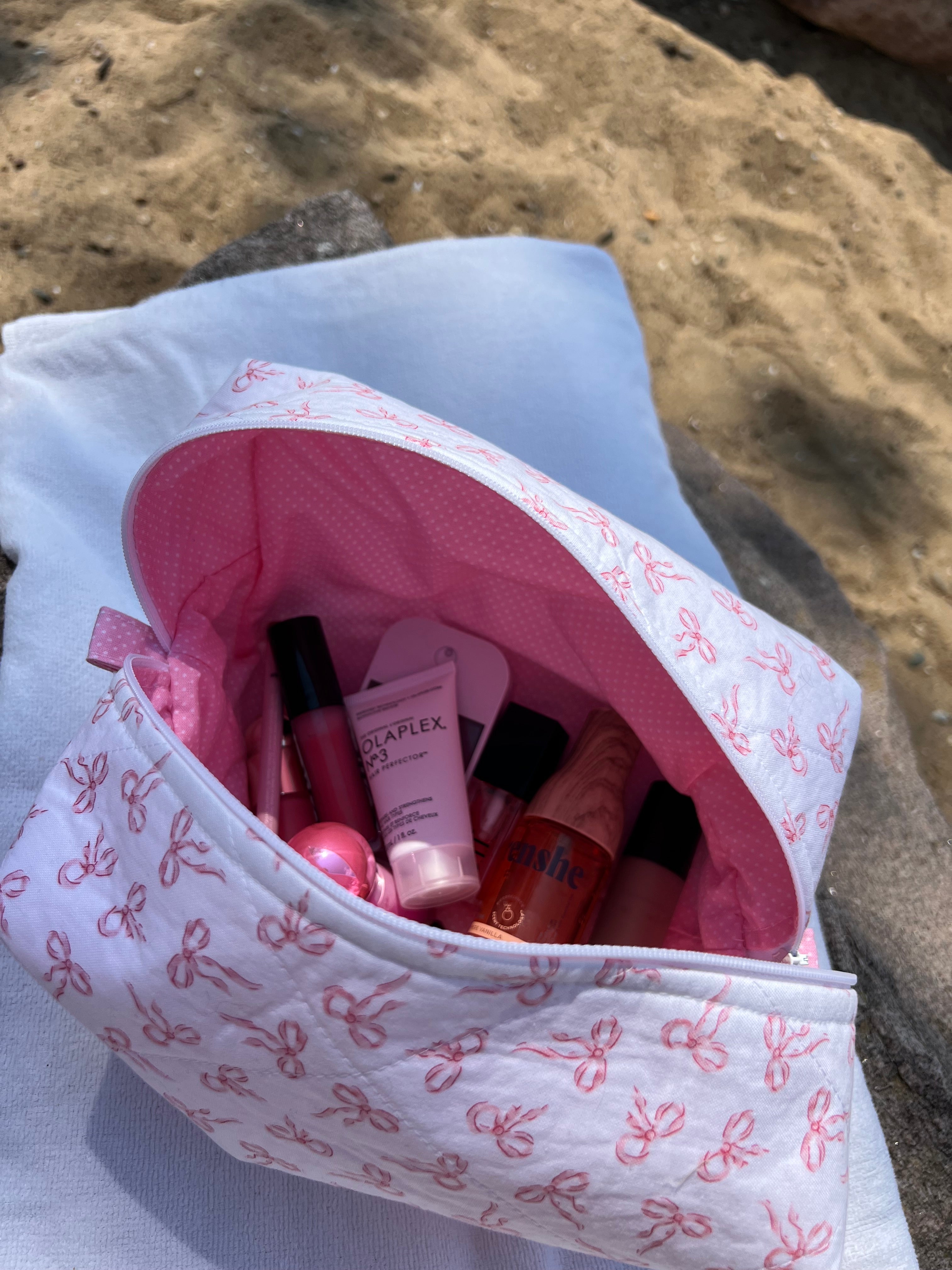 Scattered pink bow Makeup Bags