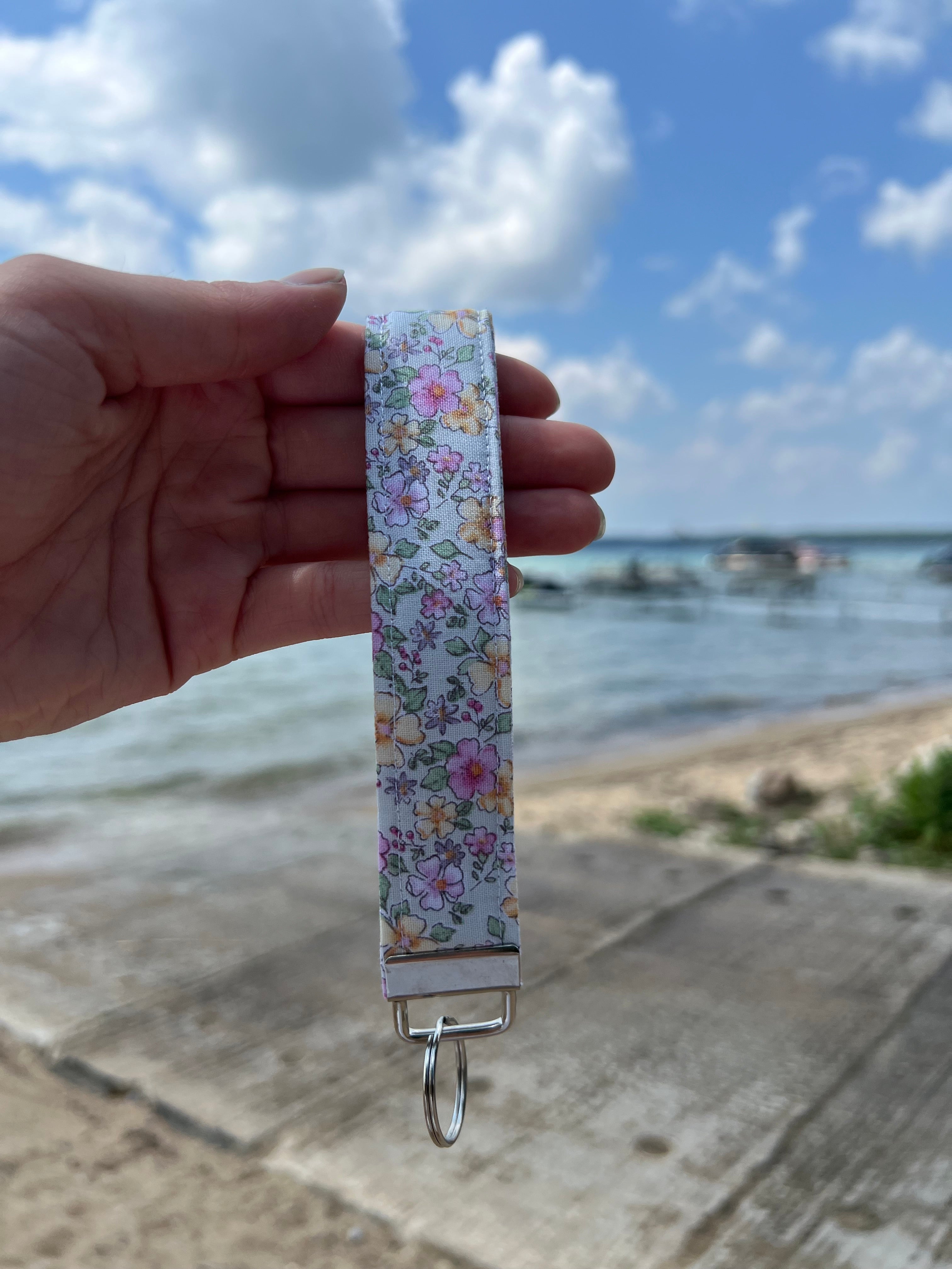 Green floral wristlet