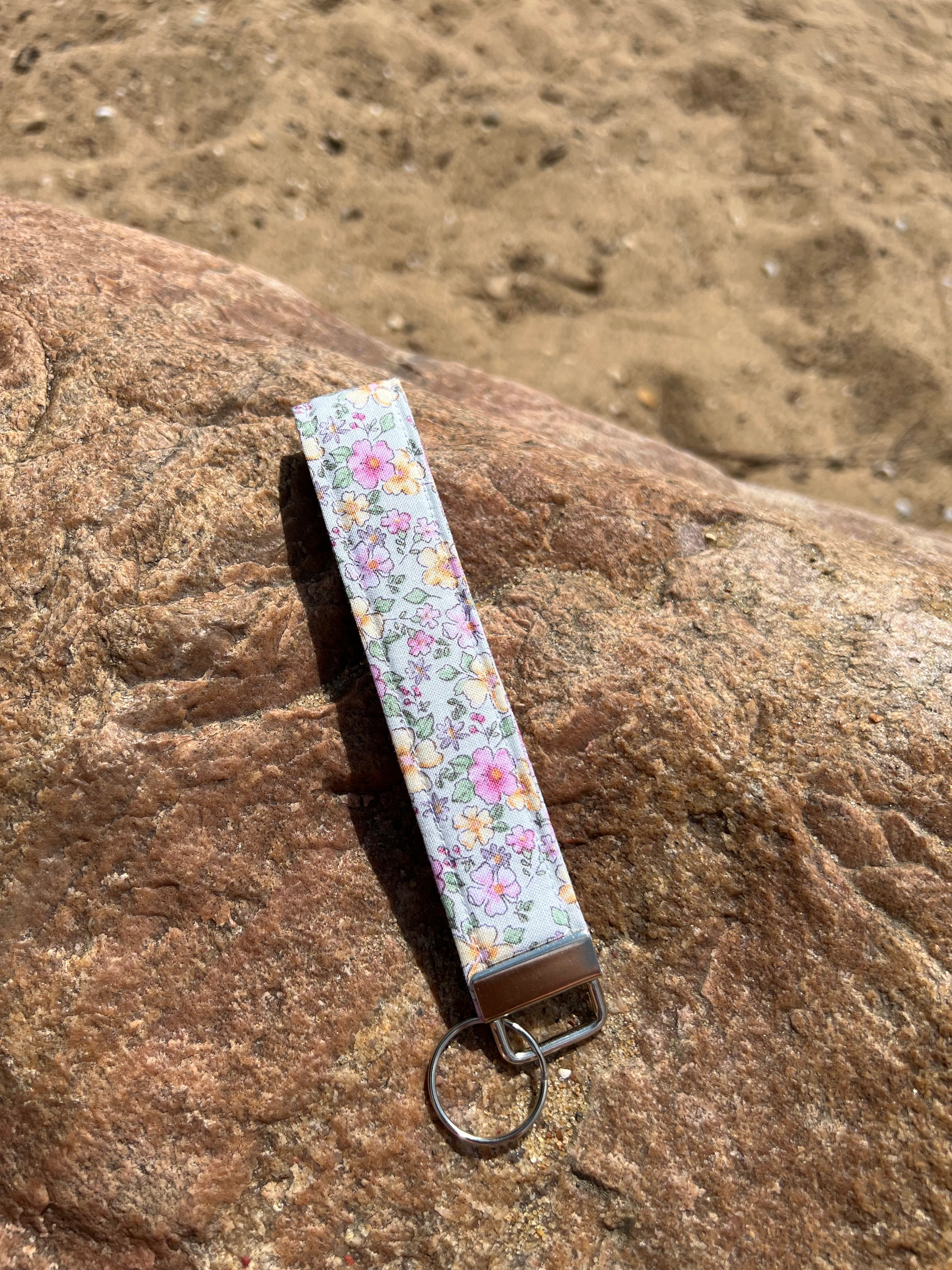 Green floral wristlet