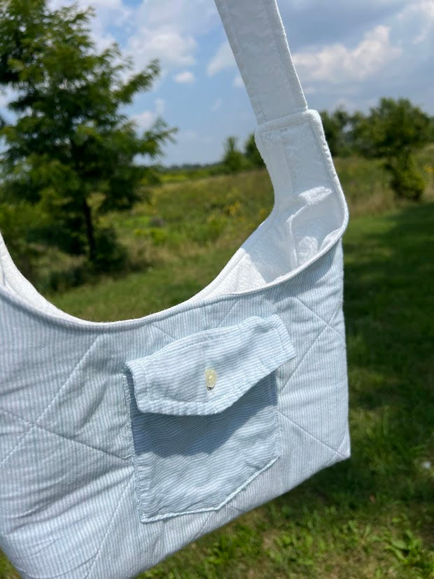 blue button up shoulder bag