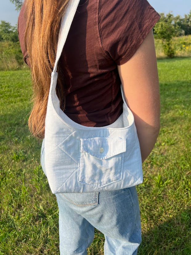 blue button up shoulder bag
